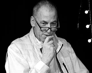 13 Thomas C. Breuer